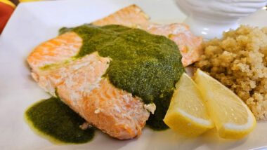 Foil baked trout with spinach pesto and quinoa