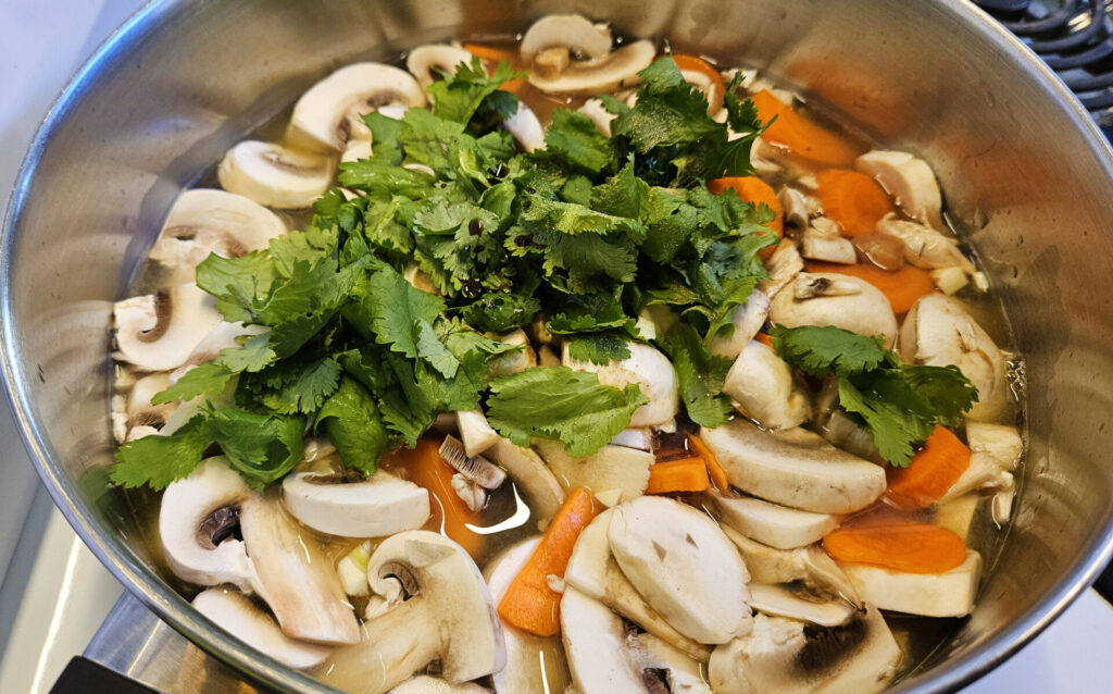 How To Make Pho Style Soup add all ingredients except chicken and green onions to the pot